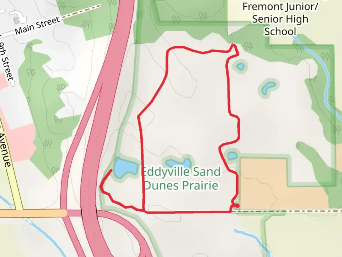 An image depicting the trail Eddyville Sand Prairie Park Loop and its surrounding area.