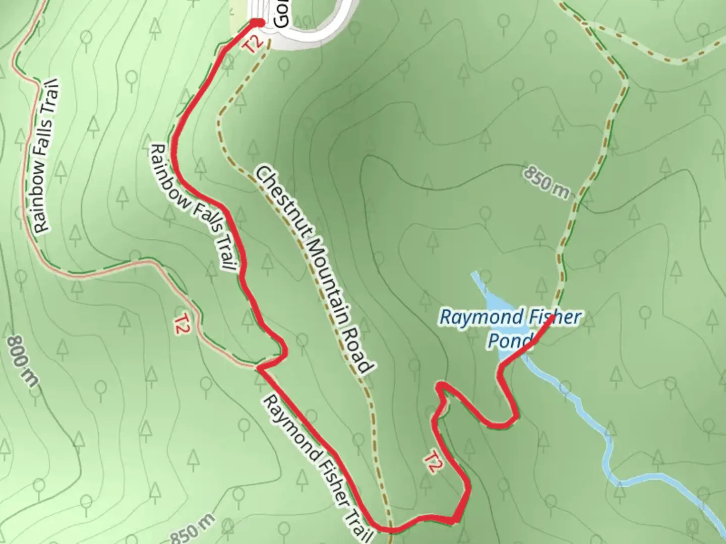 An image depicting the trail Raymond Fisher Pond Trail and its surrounding area.