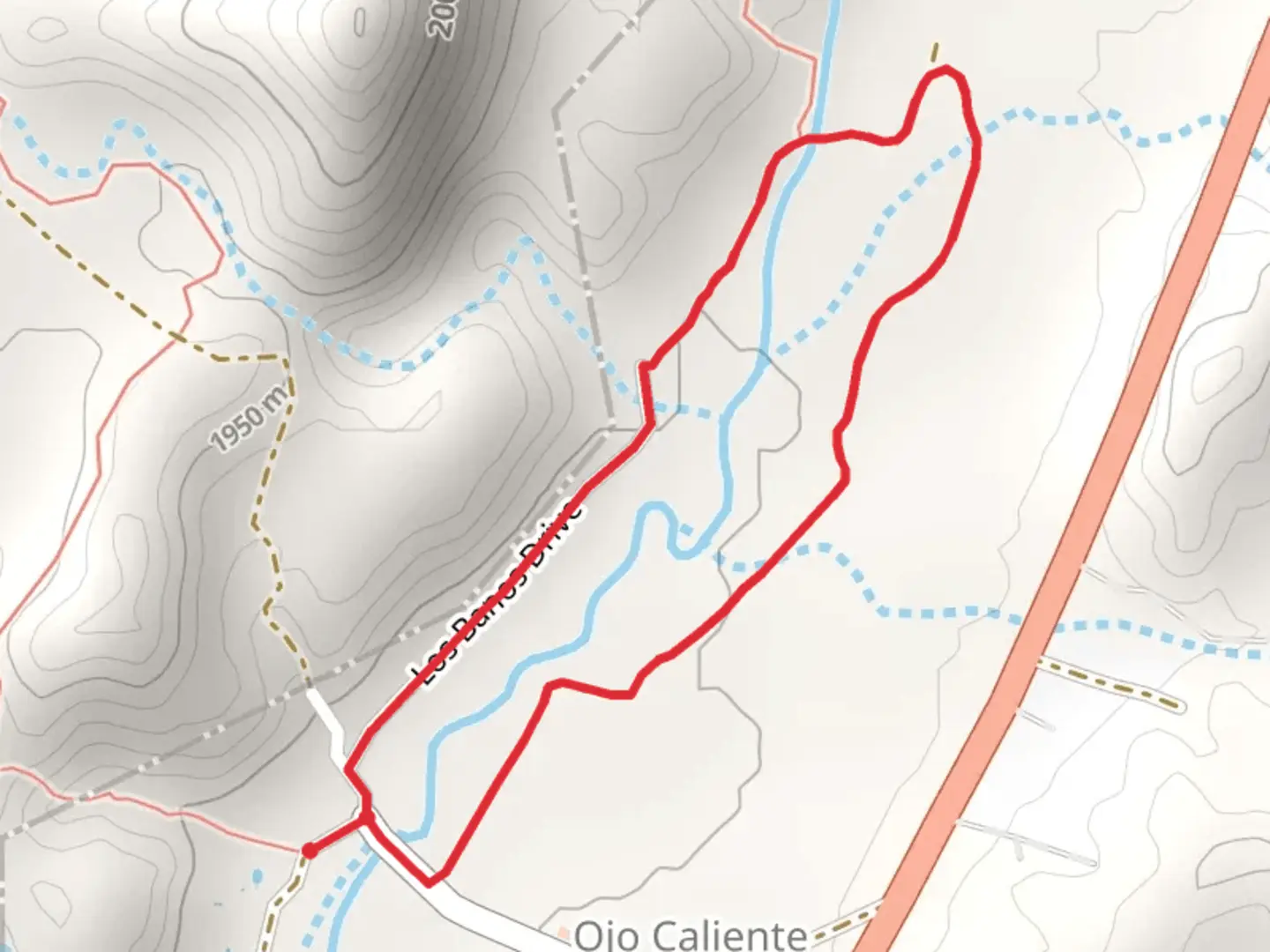An image depicting the trail Rio Ojo Caliente Loop and its surrounding area.