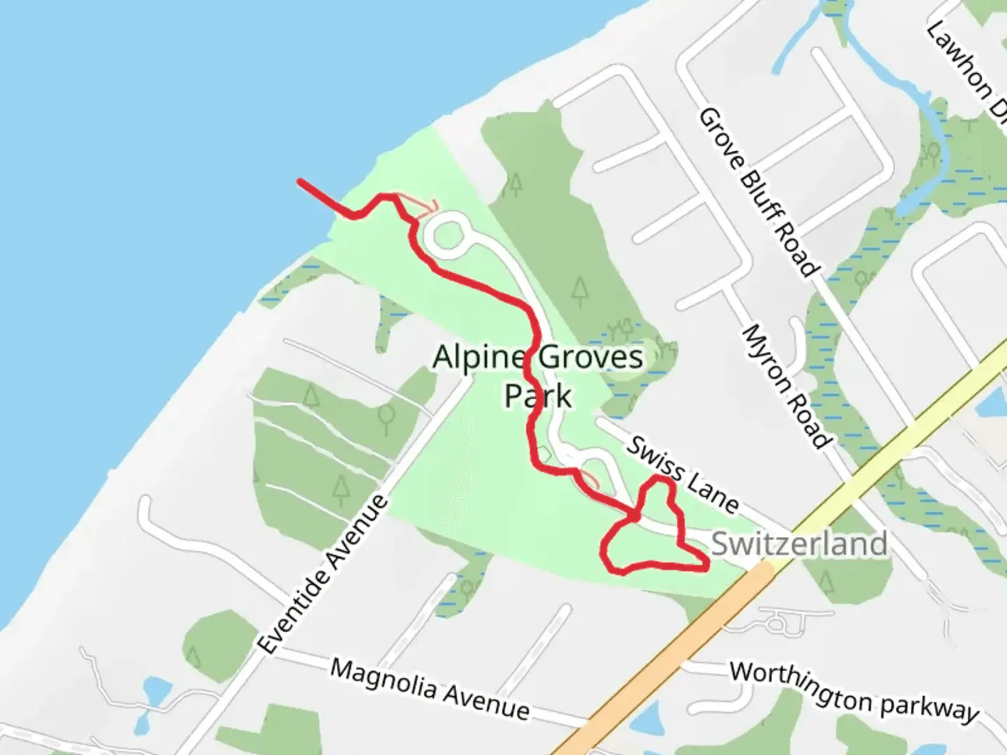 An image depicting the trail Alpine Groves Northern and Southern Trail and its surrounding area.