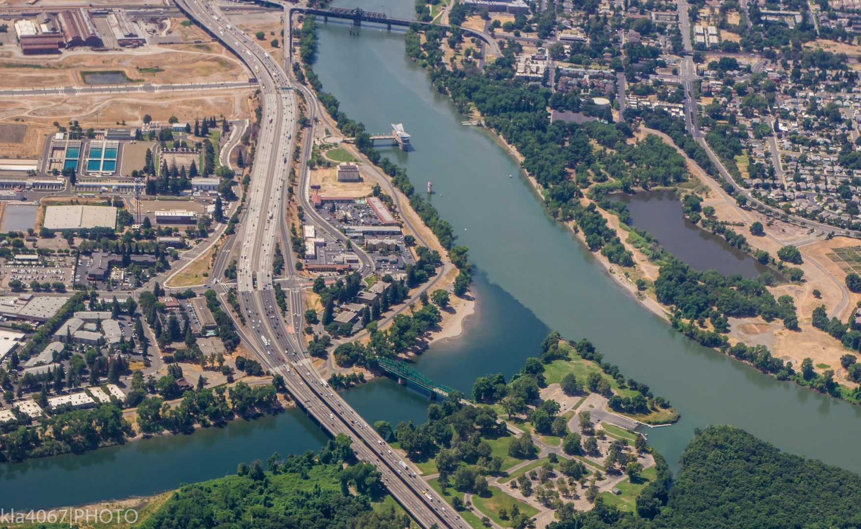 An image depicting the trail American River Trail from Upper Sunrise Drive and its surrounding area.