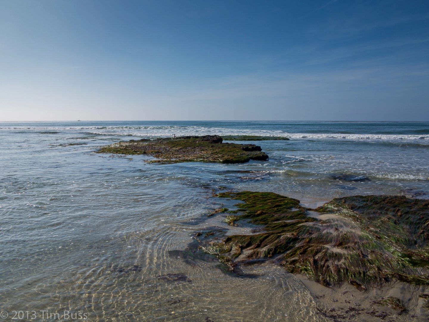 An image depicting the trail Tide Beach Park and its surrounding area.