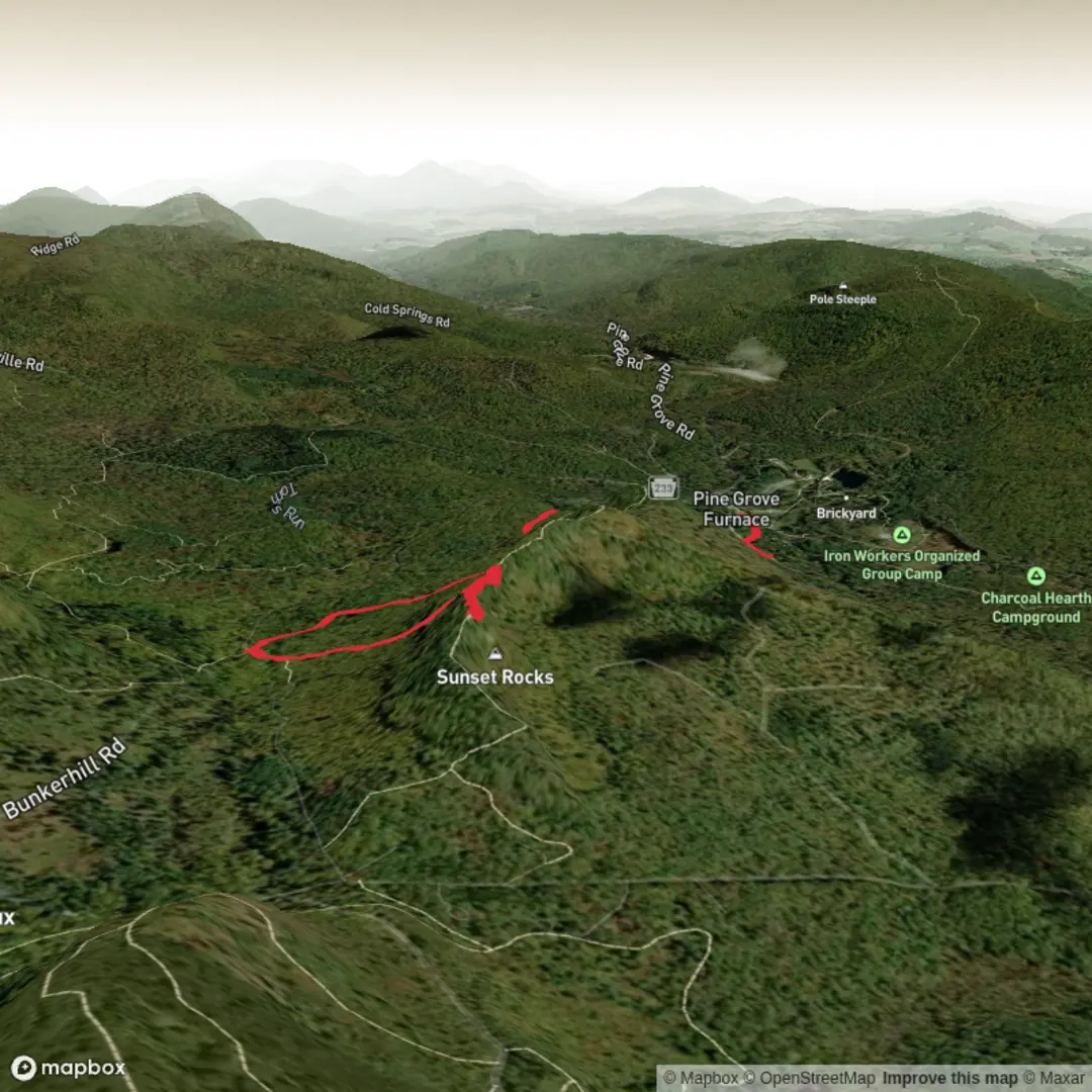 An image depicting the trail Sunset Rocks and its surrounding area.