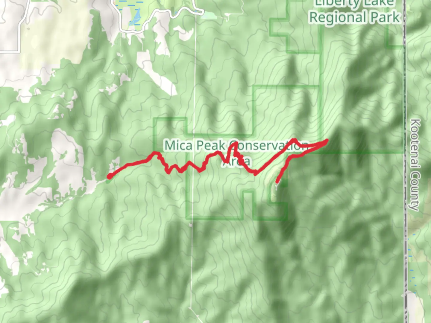 An image depicting the trail California Creek Trail and Mica Peak and its surrounding area.