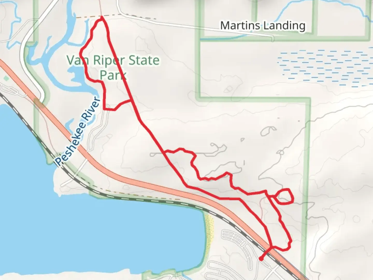 An image depicting the trail Old Wagon Road Trail and Peshekee River Loop and its surrounding area.