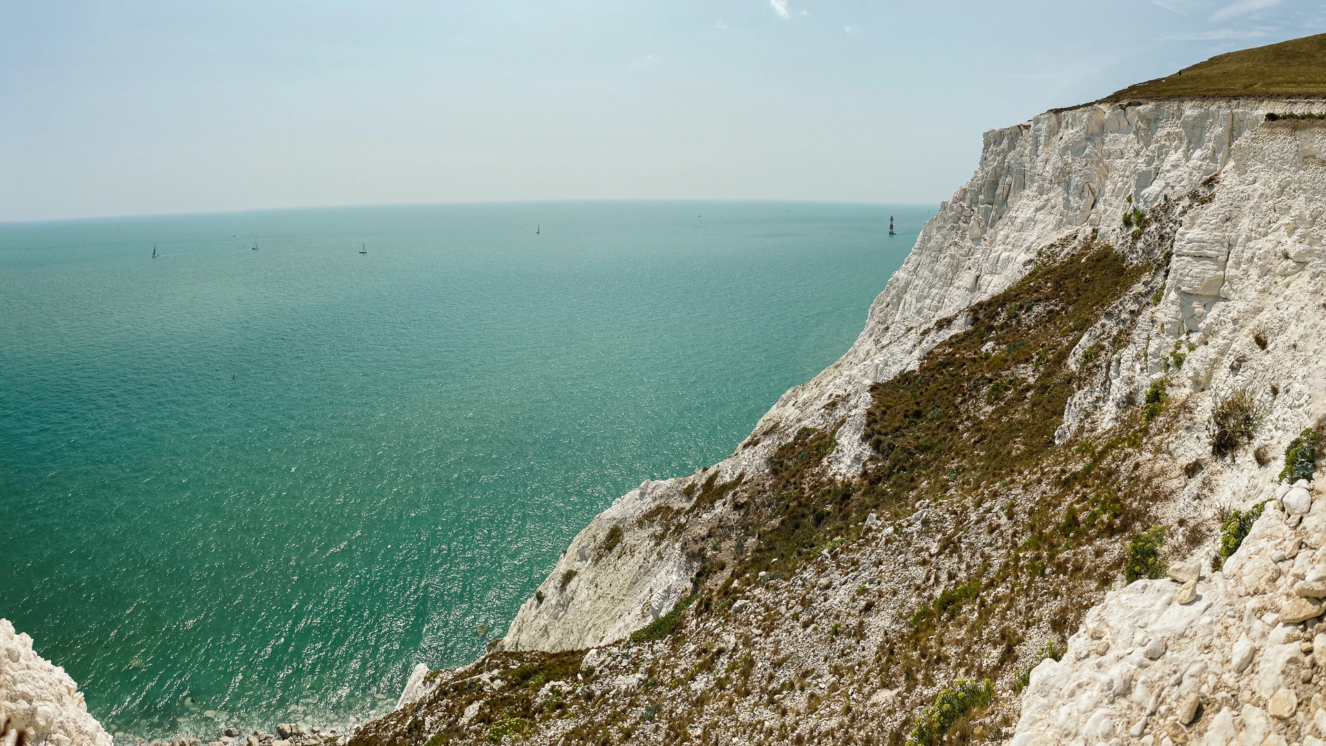An image depicting the trail Alfriston Loop via Holywell, Seven Sisters and Westdean and its surrounding area.