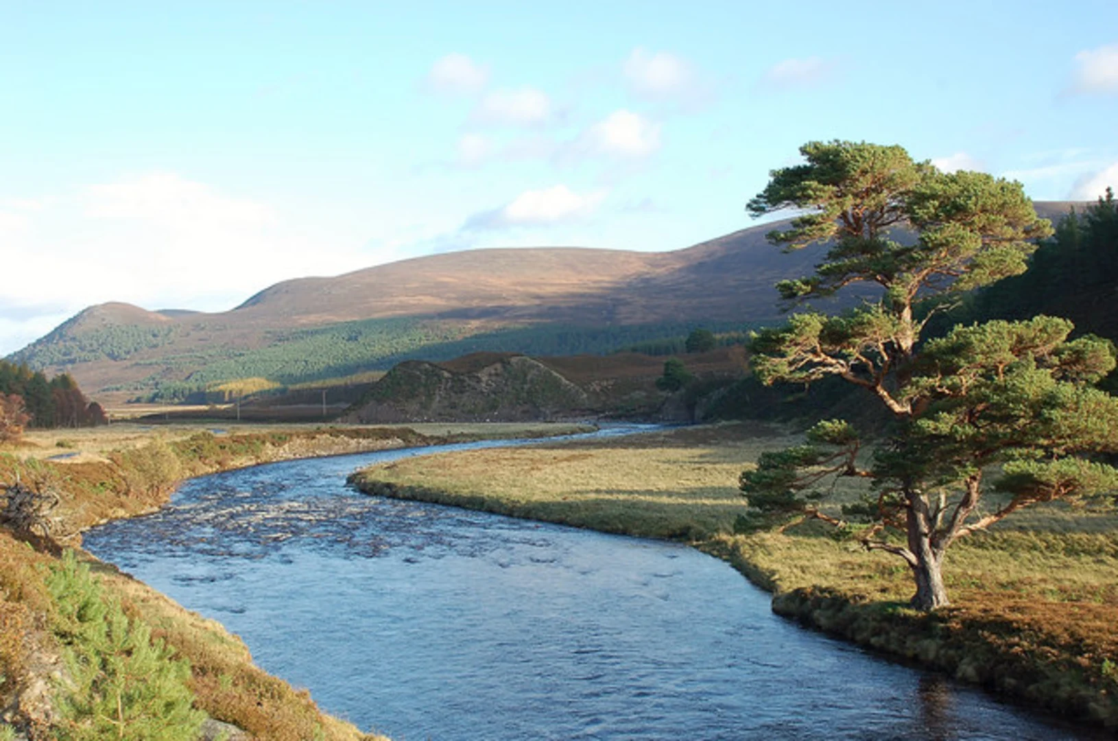 An image depicting the trail Mullach Clach a' Bhlàir Loop from Achlean and its surrounding area.