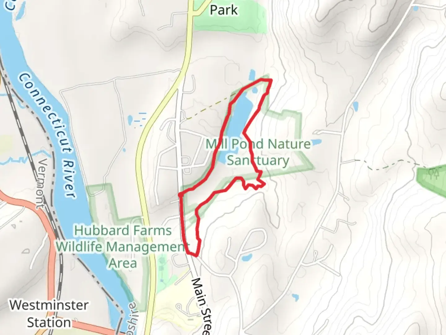An image depicting the trail Mill Pond Conservation Area Loop - Main Street and its surrounding area.