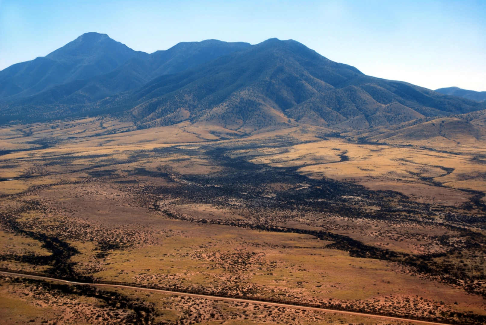 An image depicting the trail Sunnyside Canyon Trail and its surrounding area.