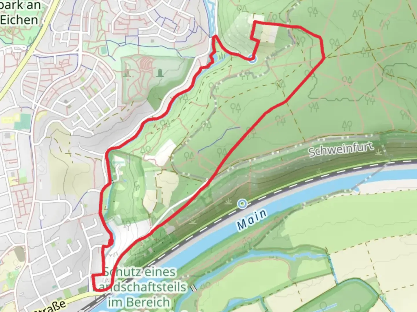 An image depicting the trail Höllenbach and Friedrich Rueckert Wanderweg and its surrounding area.