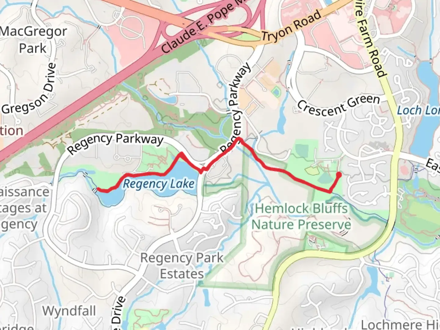 An image depicting the trail Swift Creek Greenway and Regency Lake and its surrounding area.