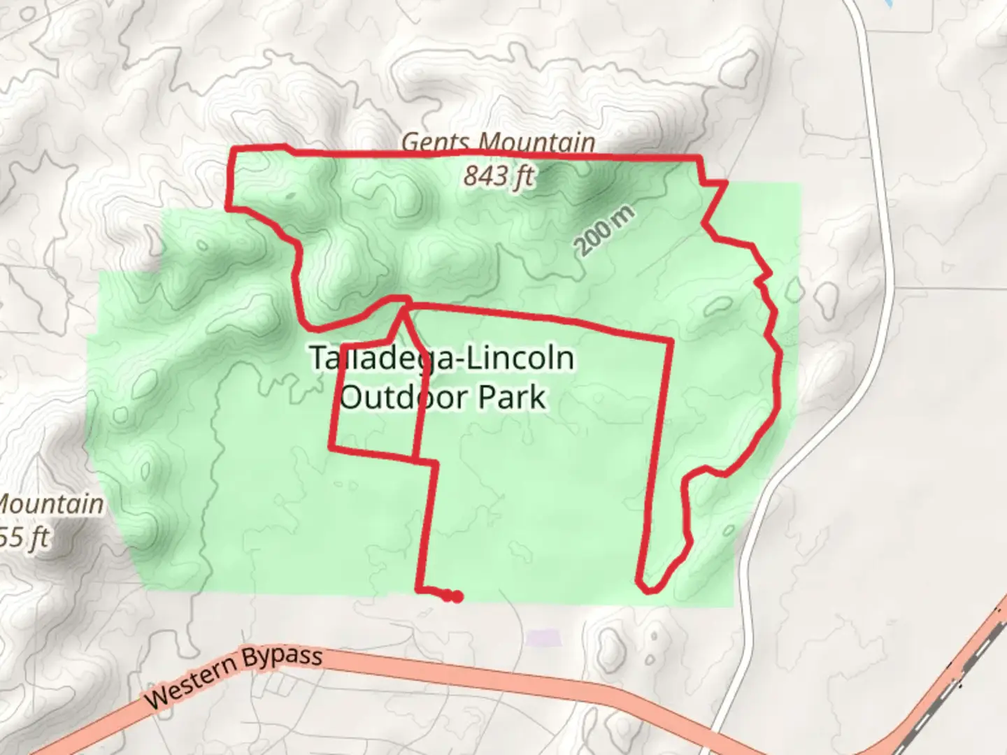 An image depicting the trail Gents Mountain and Talladega Lincoln Outdoor Park Walk and its surrounding area.