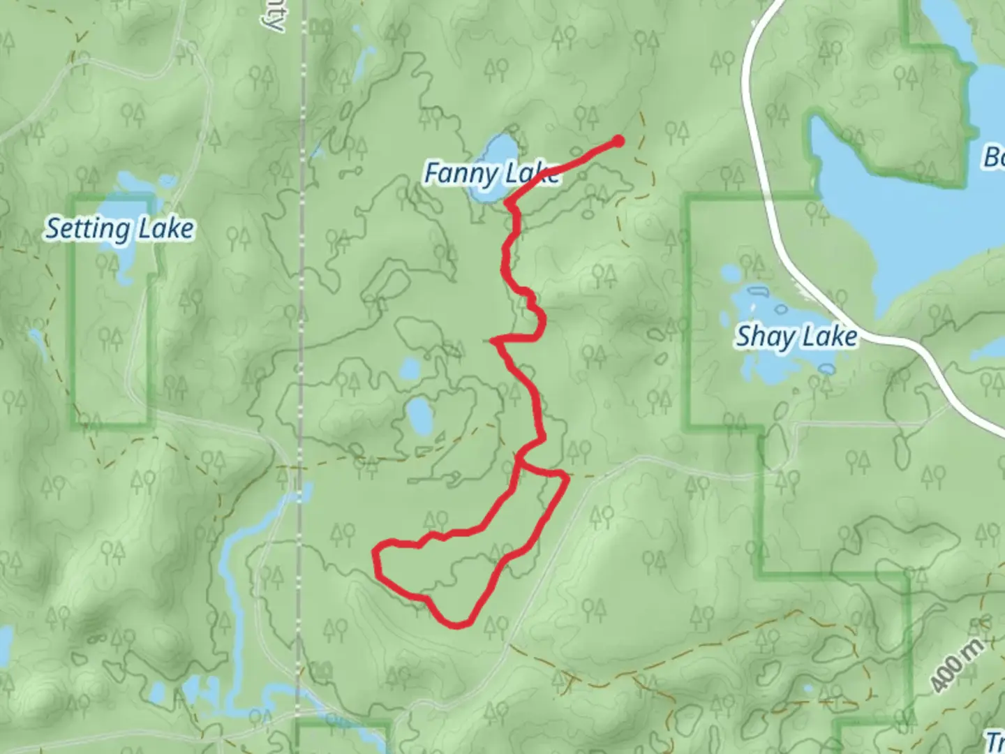 An image depicting the trail Walk beside Mary Creek from Fanny Lake Lane and its surrounding area.