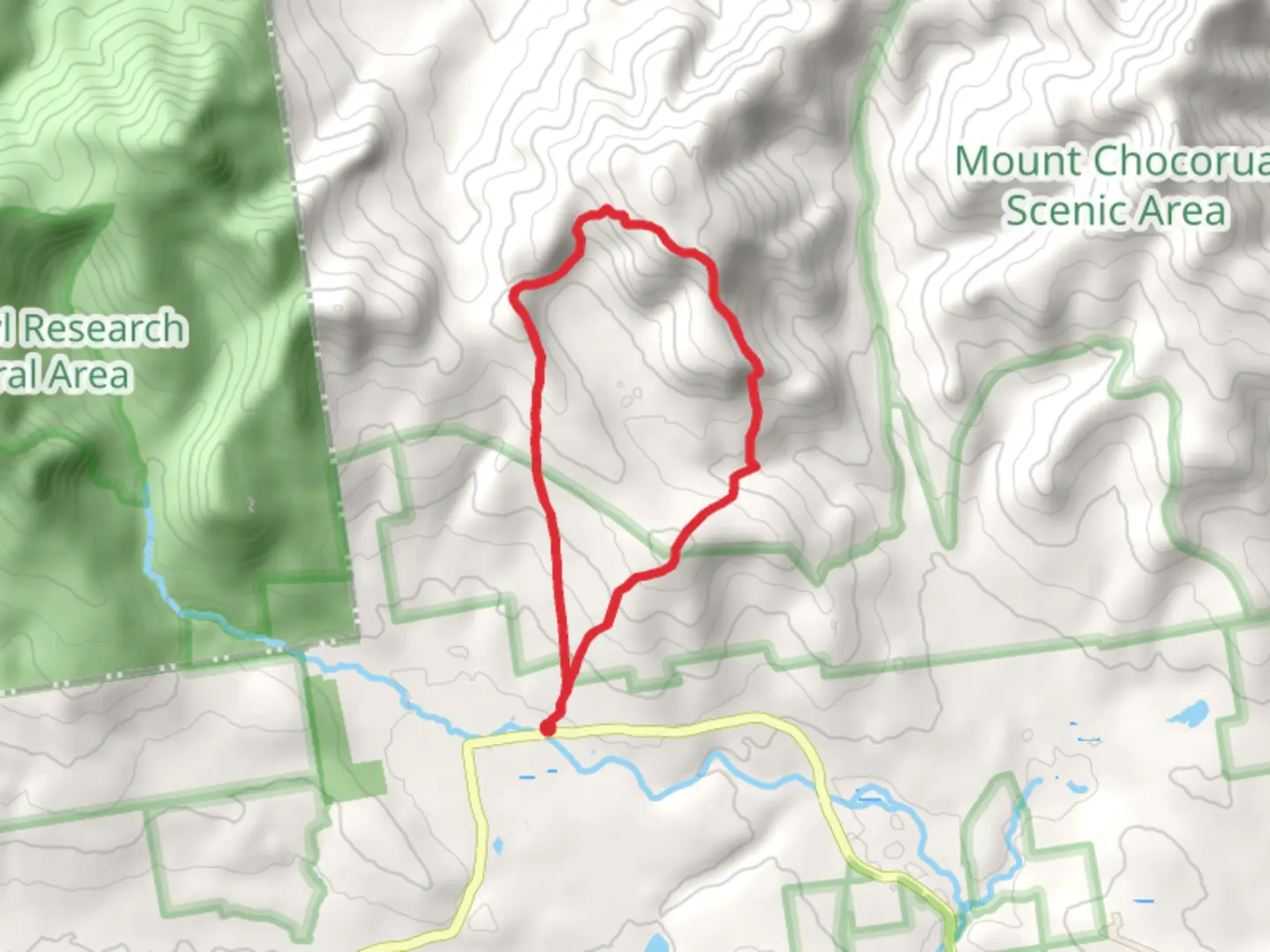 An image depicting the trail Mount Paugus and Mount Mexico Loop and its surrounding area.