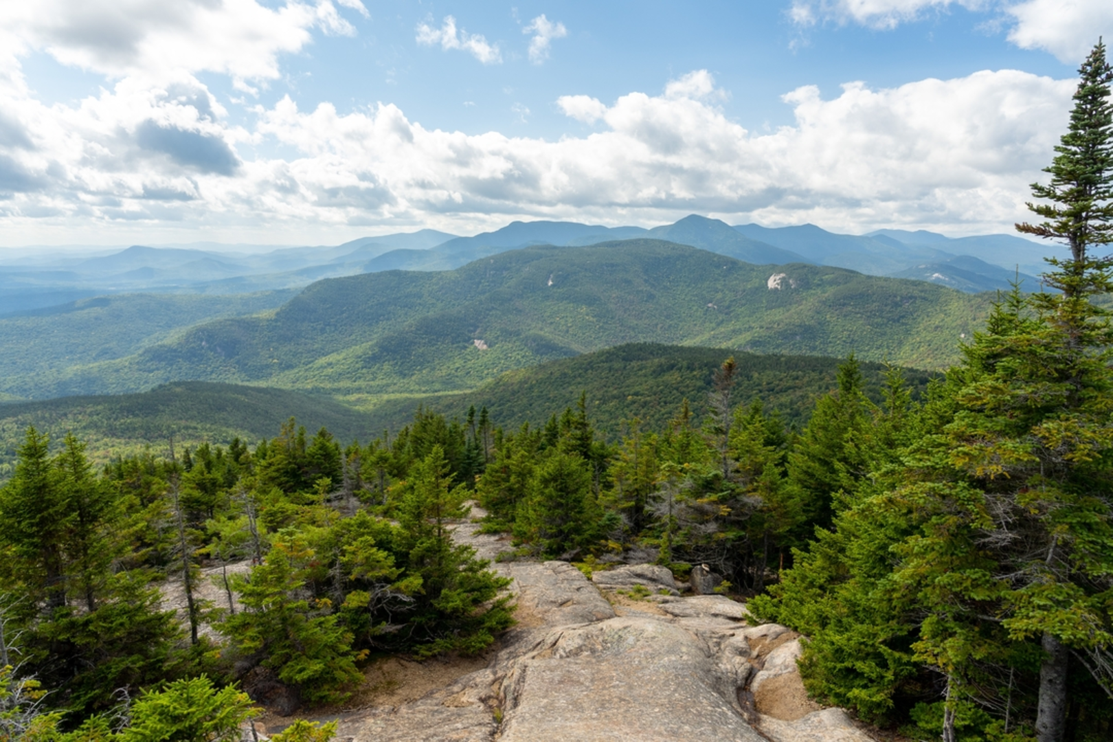 An image depicting the trail Mount Chocorua via Champney Brook Trail and its surrounding area.