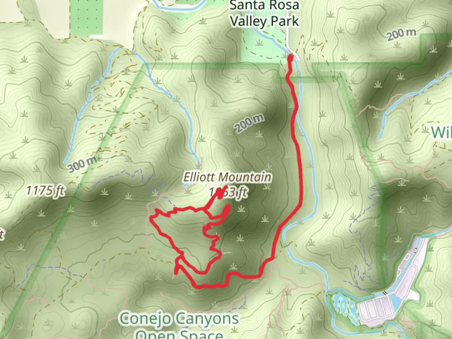 An image depicting the trail Elliott Mountain via Outlaw Loop and its surrounding area.