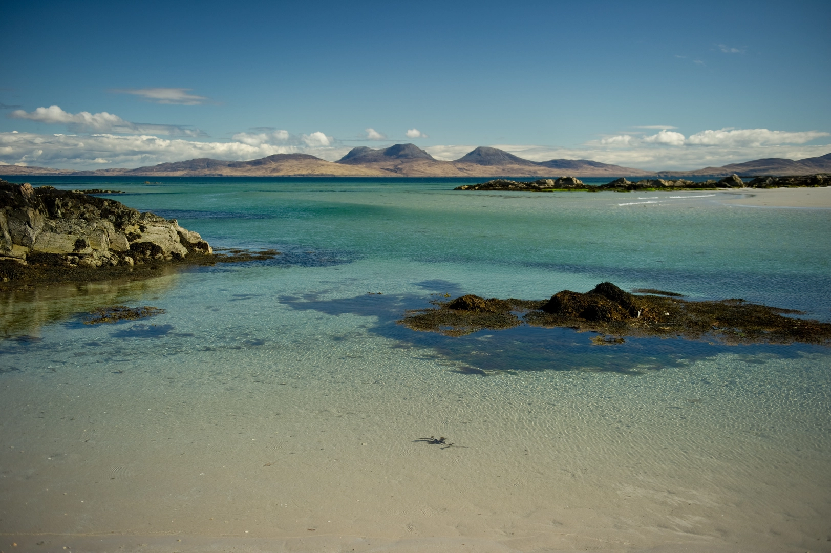 An image depicting the trail Loch Staosnaig, Rubha Dubh, Port na Arbhair and Plaide Mhor Loop and its surrounding area.