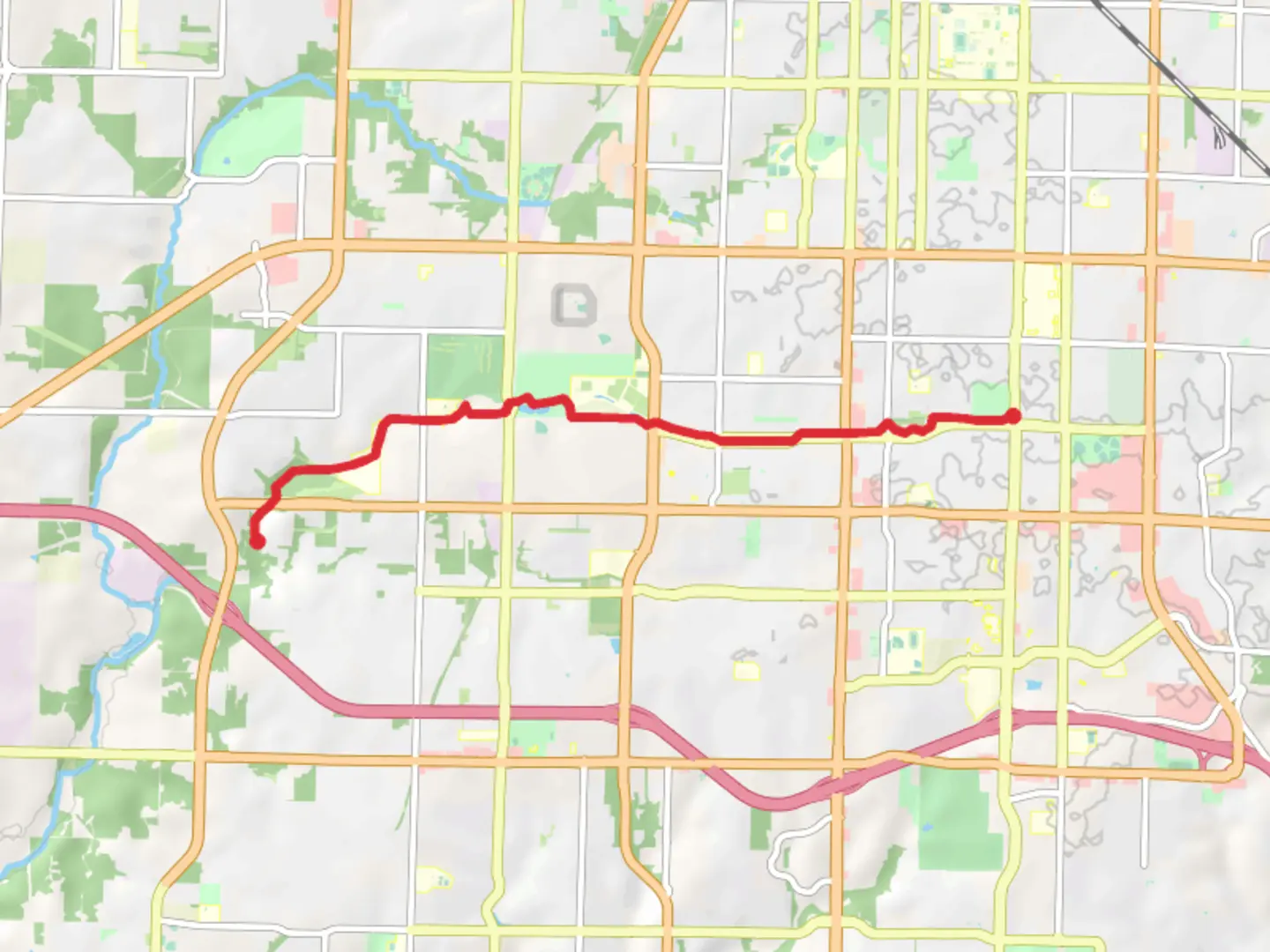 An image depicting the trail South Creek Greenway and its surrounding area.