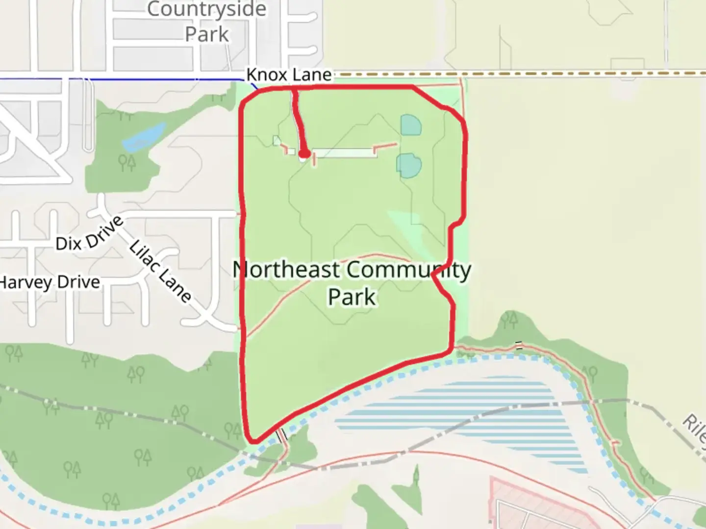 An image depicting the trail Northeast Community Park Loop and its surrounding area.