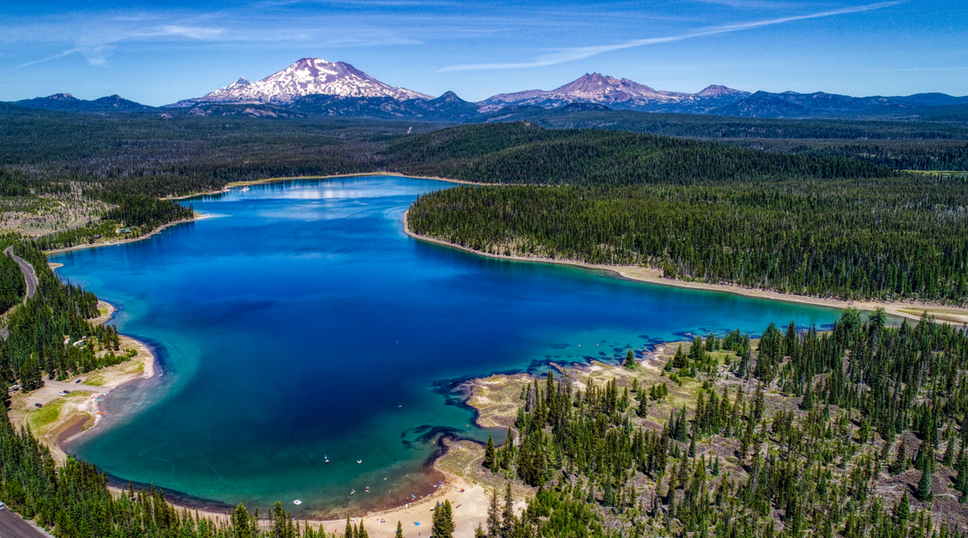 An image depicting the trail Mink Lake via Six Lakes Trail and its surrounding area.