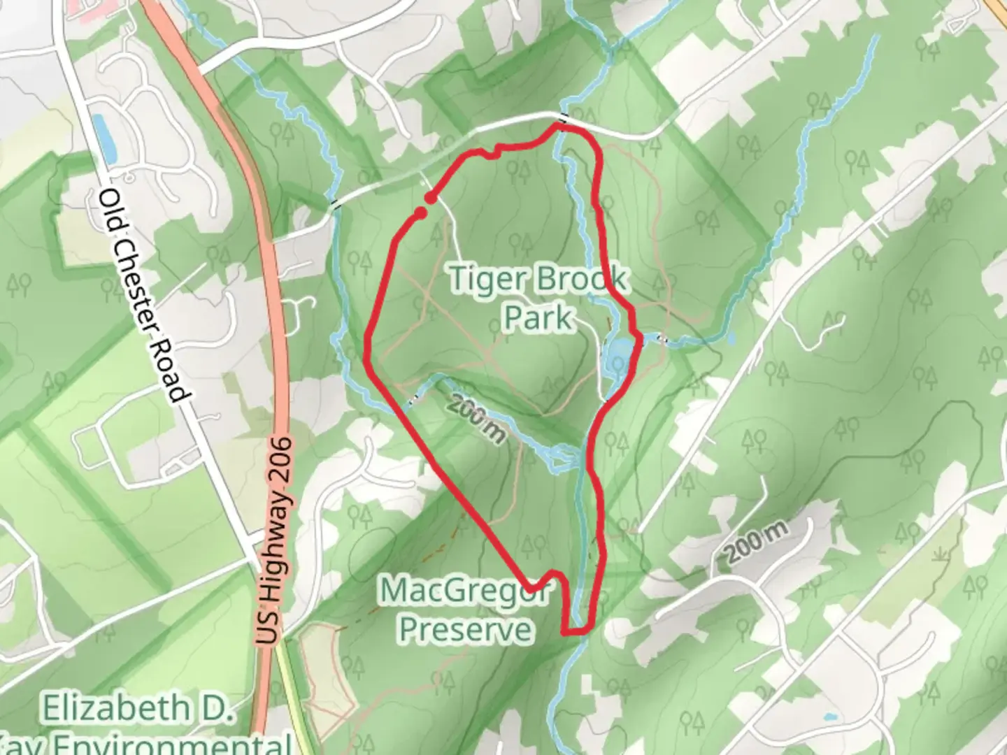 An image depicting the trail Tiger Brook Reservoir via Yellow Trail and its surrounding area.