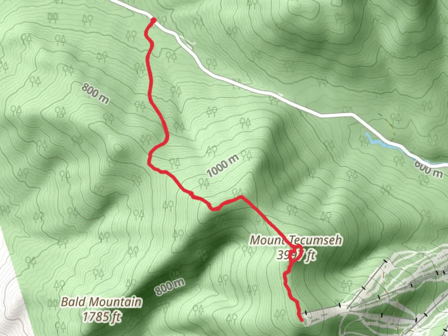 An image depicting the trail Mount Tecumseh from Tripoli Road and its surrounding area.