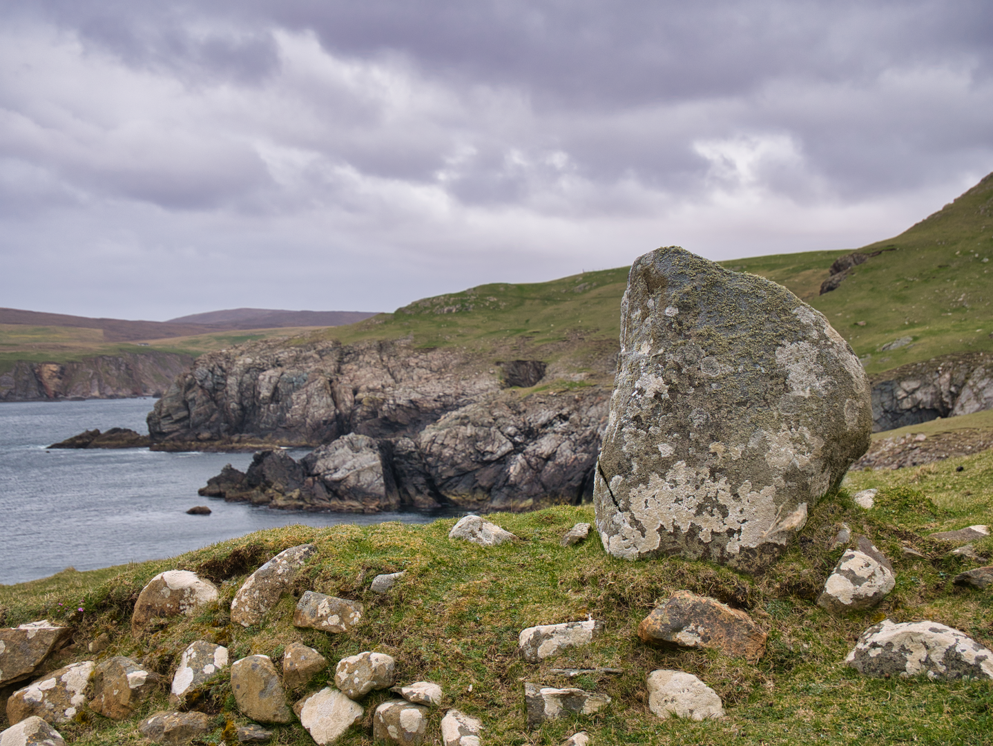 An image depicting the trail Walking the Coastline of Shetland - Round Northmavine Trek and its surrounding area.