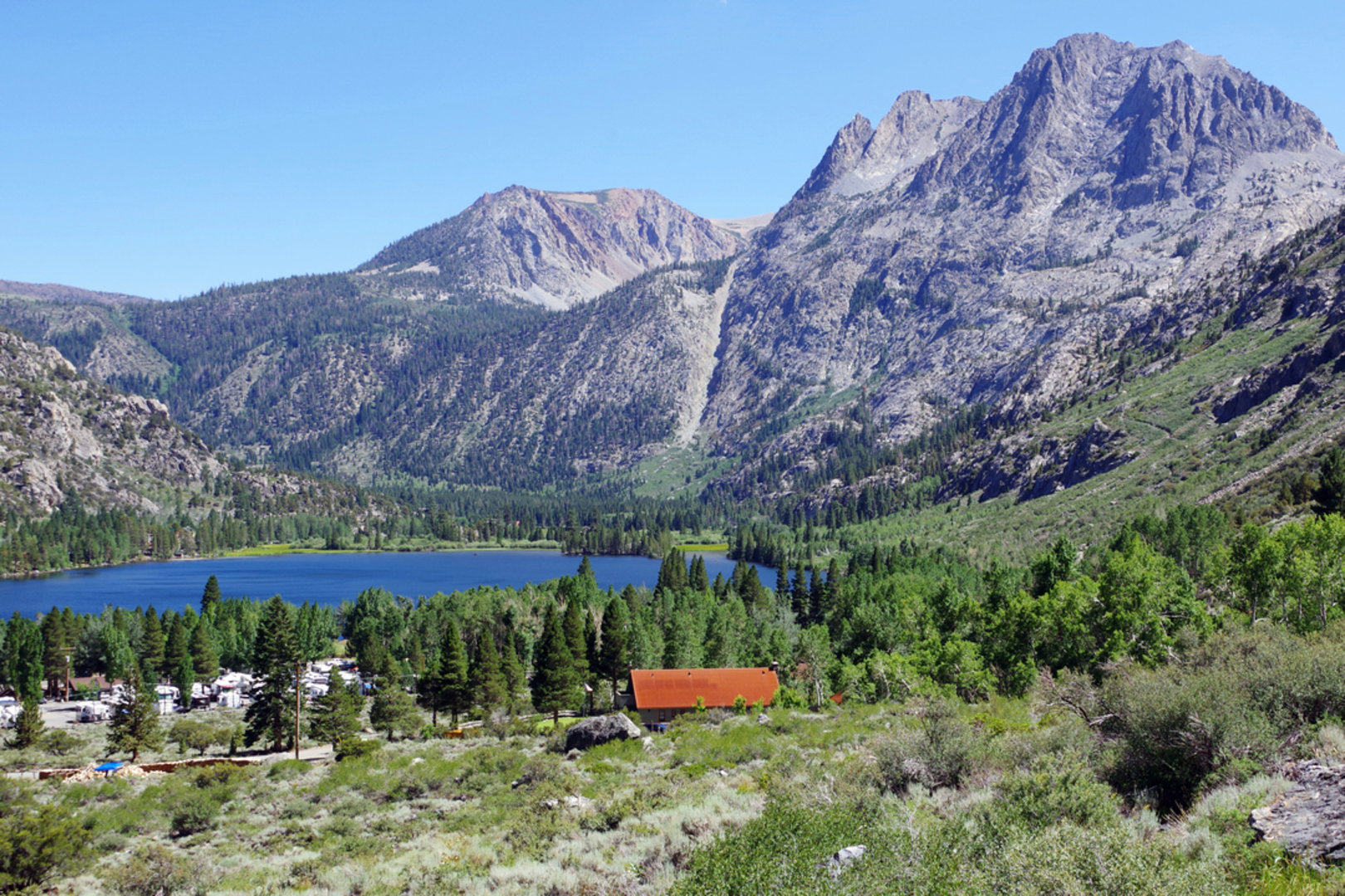 An image depicting the trail Yost Lake via Yost Creek Trail and its surrounding area.