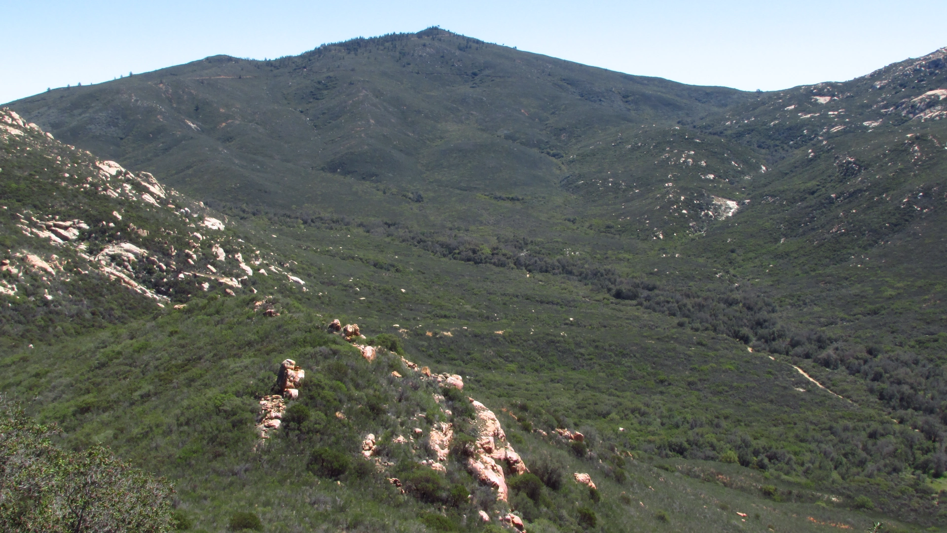 An image depicting the trail Los Pinos Mountain and its surrounding area.