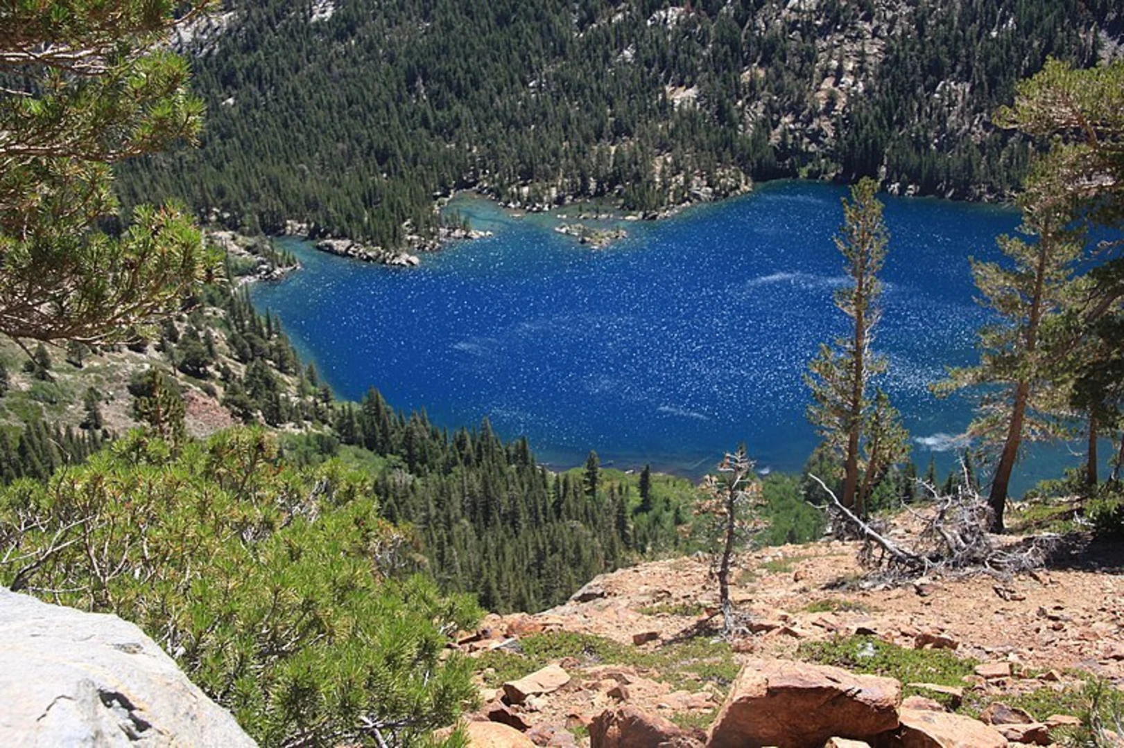 An image depicting the trail West Lake via Green Creek Trail and its surrounding area.