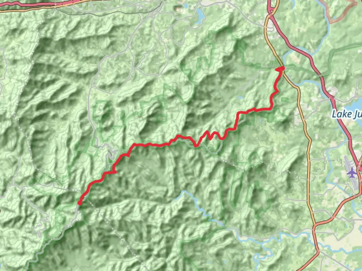 An image depicting the trail Shit-in Trail via Little Pisgah Mountain and Ferrin Knob and its surrounding area.