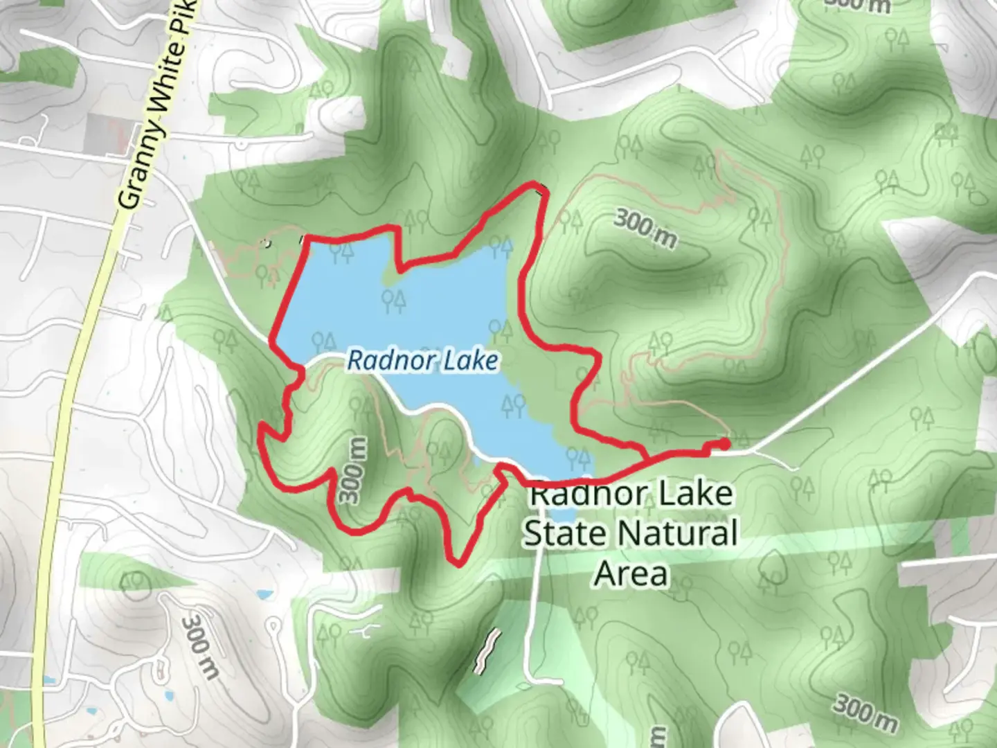 An image depicting the trail Radnor Lake State Natural Area Loop and its surrounding area.