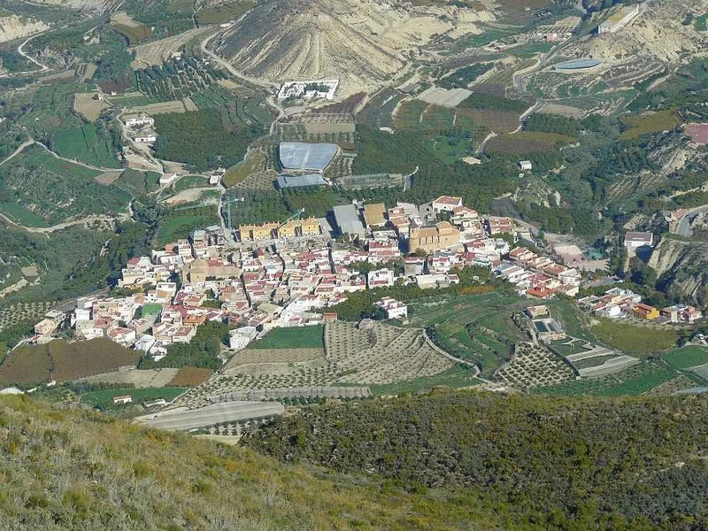 An image depicting the trail Hermitage of the Cross PR A 365 and its surrounding area.