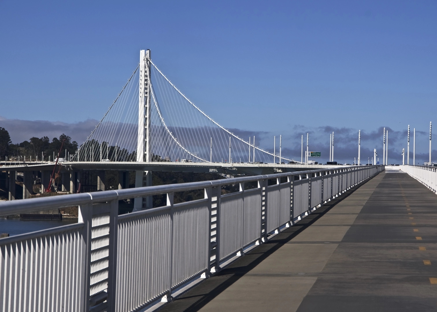 An image depicting the trail Alexander Zuckermann Bay Bridge Trail and its surrounding area.