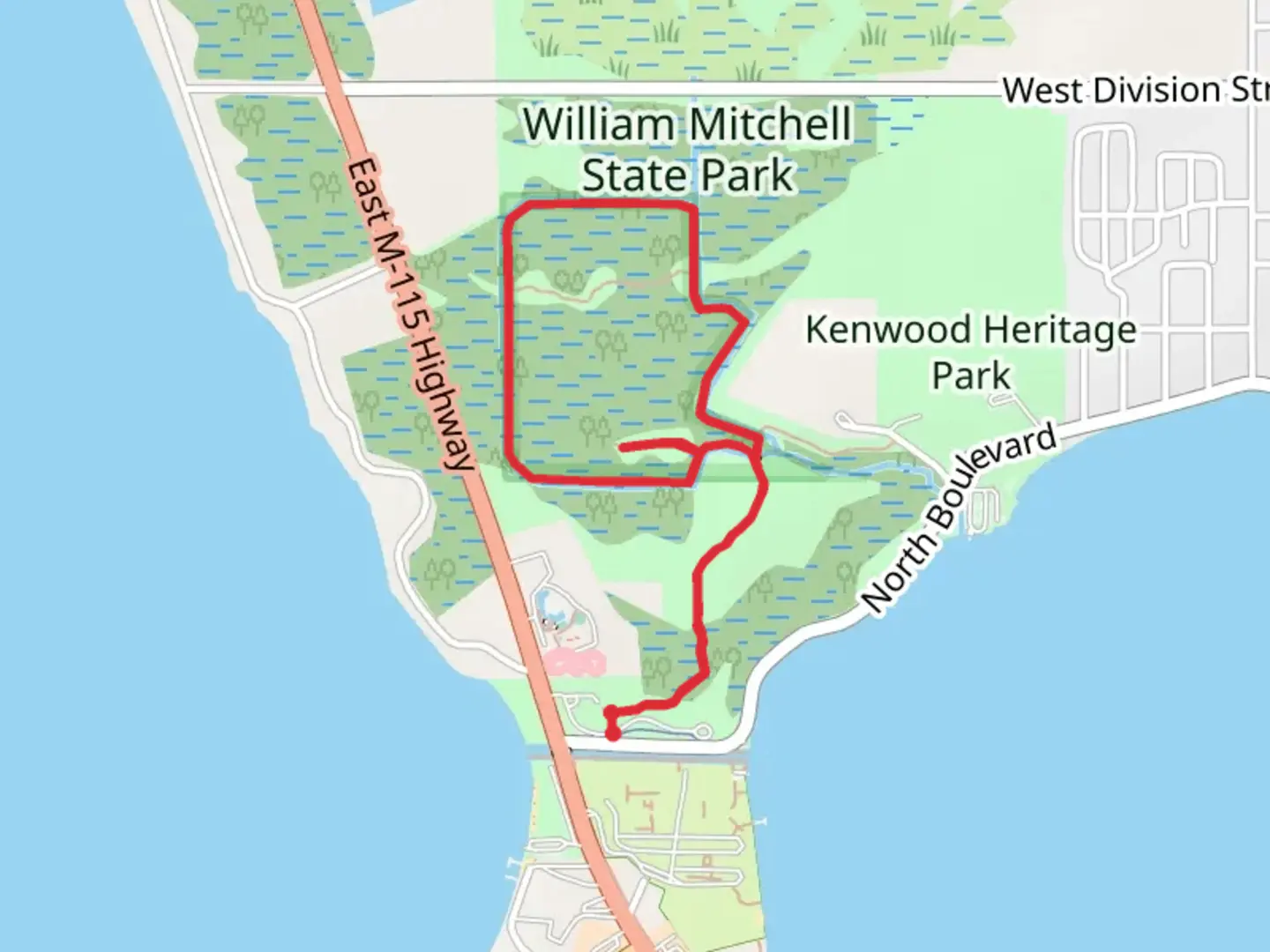 An image depicting the trail William Mitchell State Park Loop - South and its surrounding area.