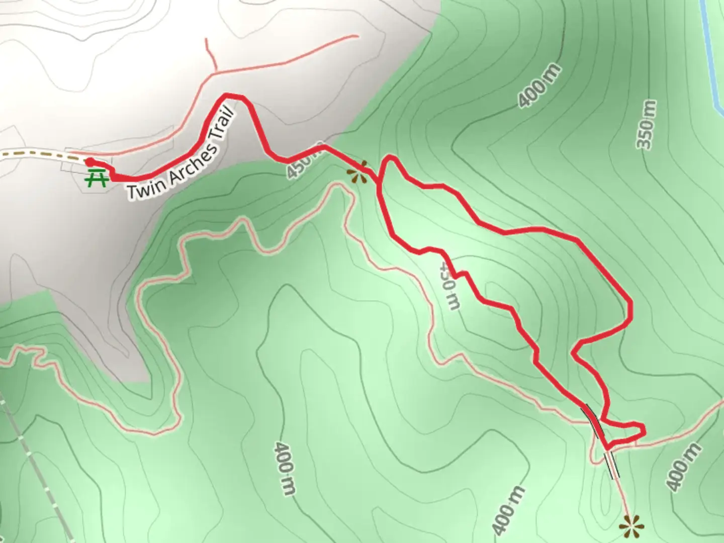 An image depicting the trail Twin Arches Loop and its surrounding area.