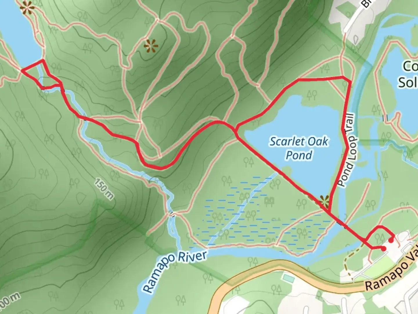 An image depicting the trail Scarlet Oak Pond and MacMillan Reservoir via Vista Trail and its surrounding area.
