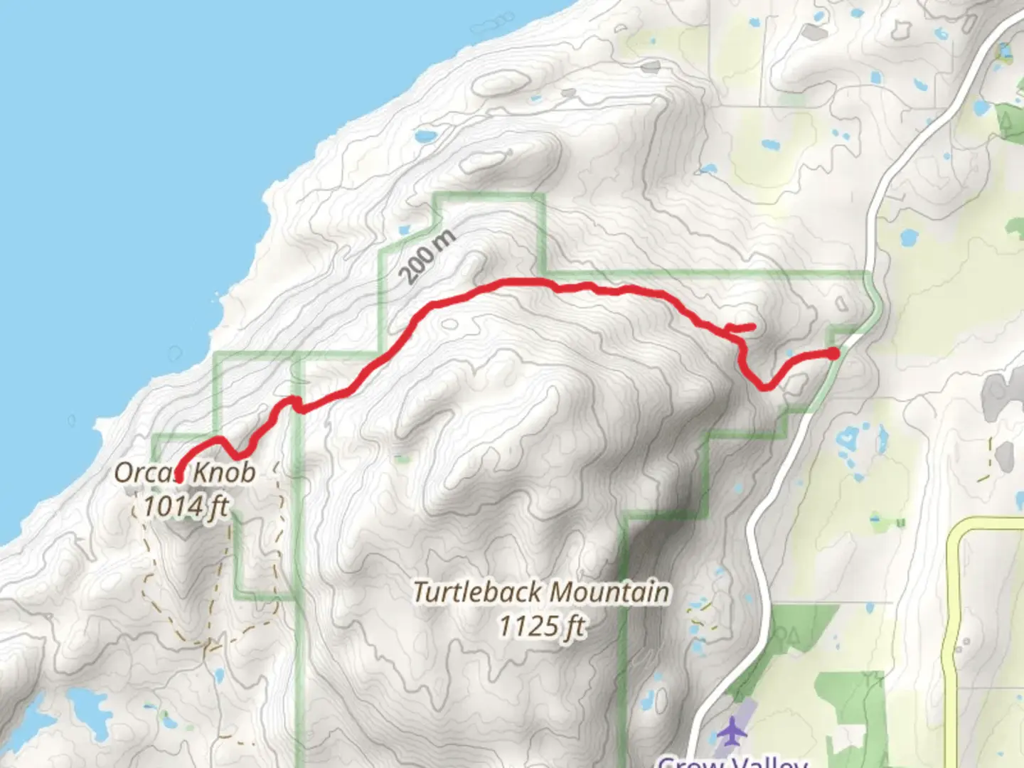 An image depicting the trail Orcas Knob via North Trail and its surrounding area.