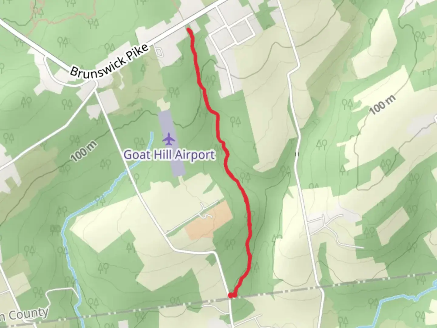 An image depicting the trail Dry Run Creek Trail - Blue and its surrounding area.