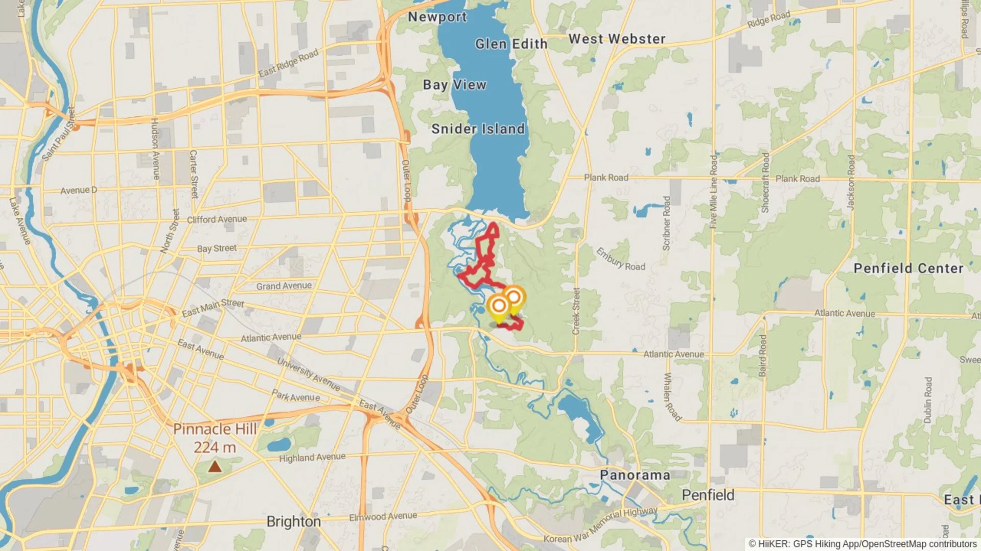 An image depicting the trail White Trail and Blue Trail Loop - Browncroft Boulevard and its surrounding area.