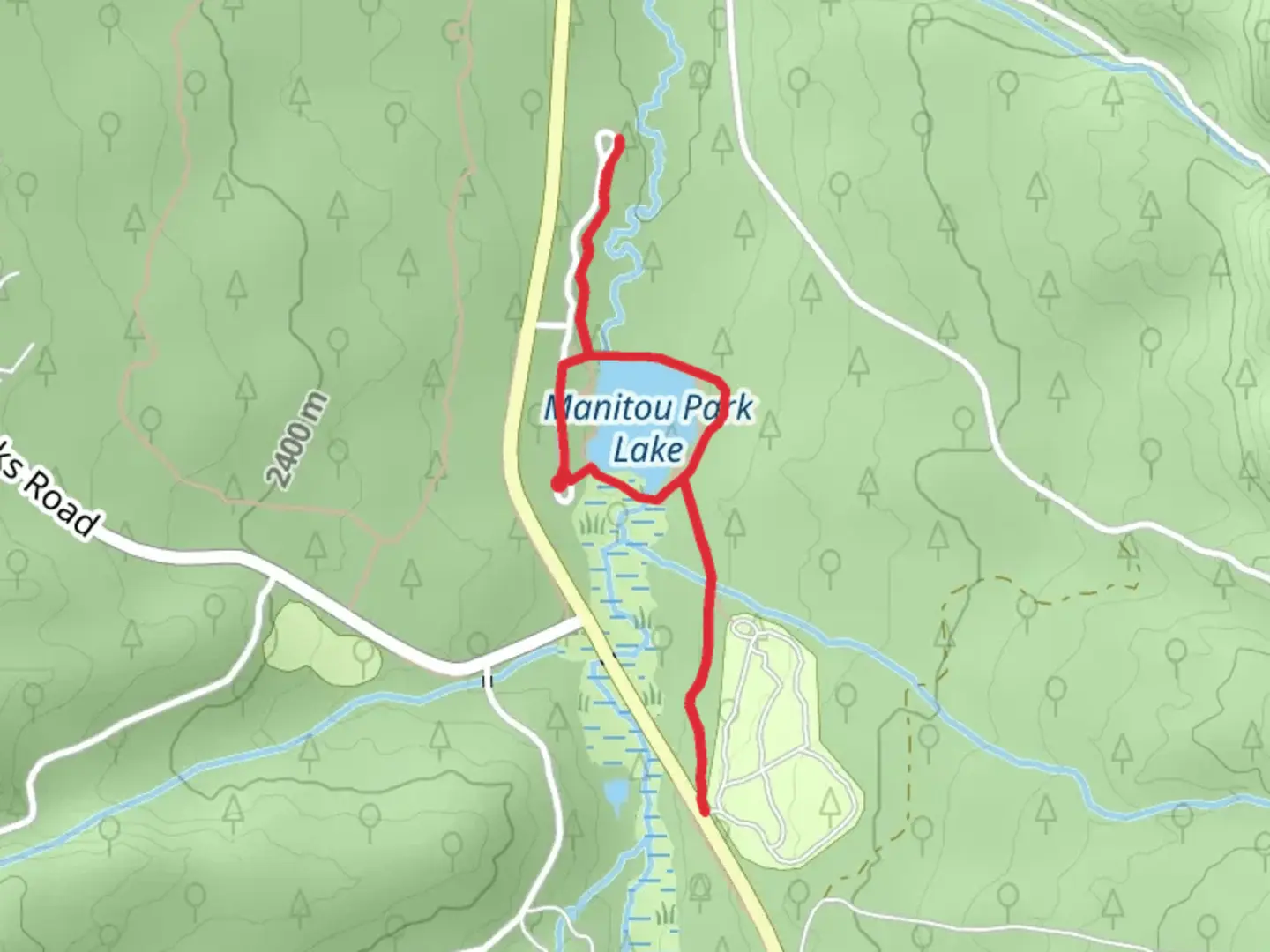 An image depicting the trail Manitou Park Lake Loop and its surrounding area.