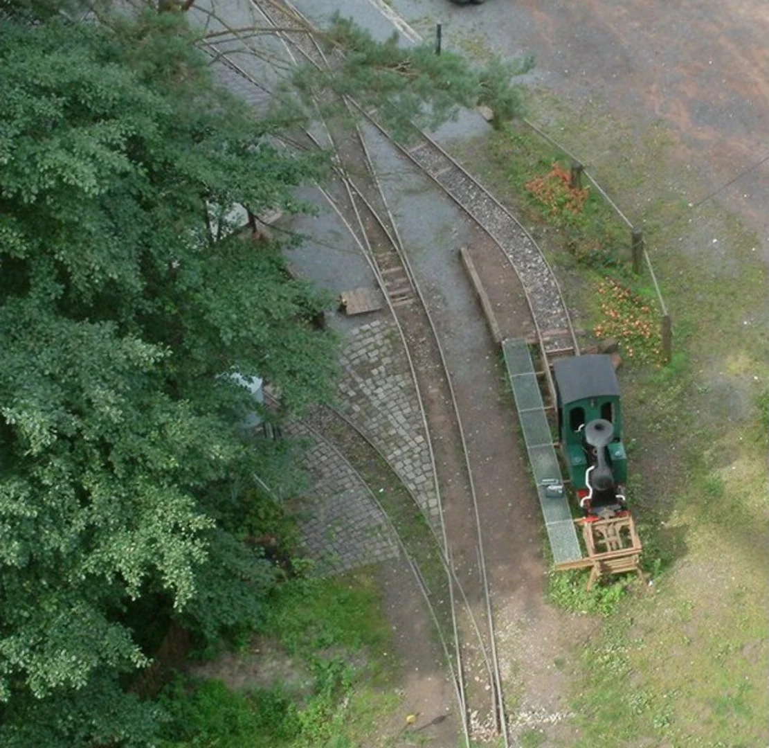 An image depicting the trail Lauberhof and Stumpfwaldbahn Loop via Pfälzerwald Blauer Balken and its surrounding area.