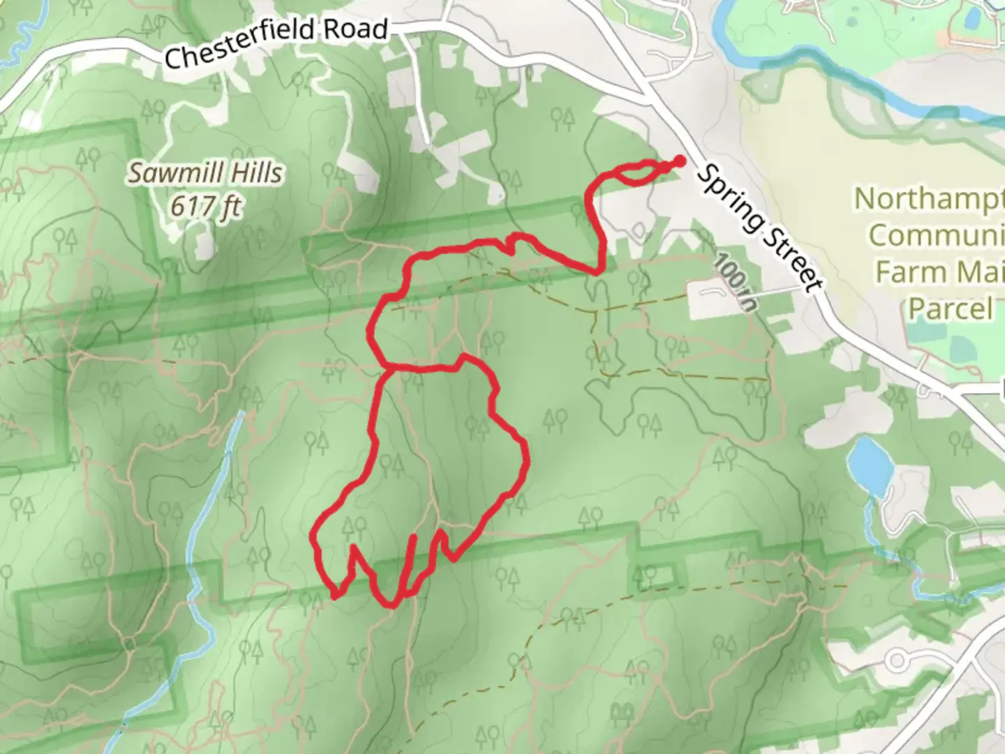 An image depicting the trail Sawmill Hills - Spring Street and its surrounding area.