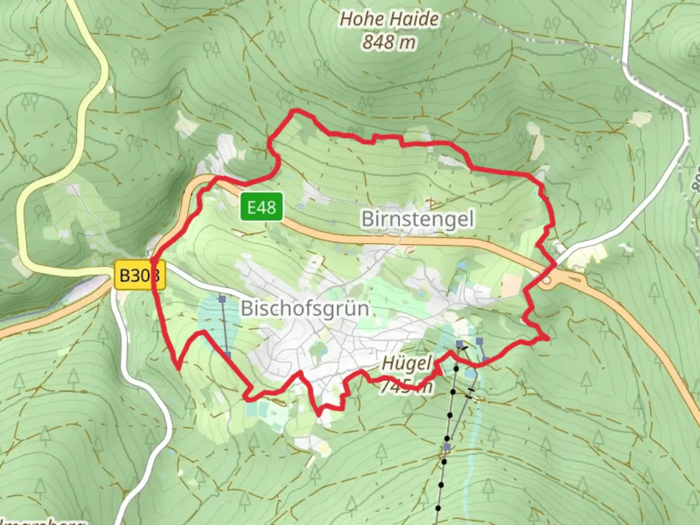 An image depicting the trail Bischofsgrun Loop via Hugelfels and Ehrenfriedhof and its surrounding area.