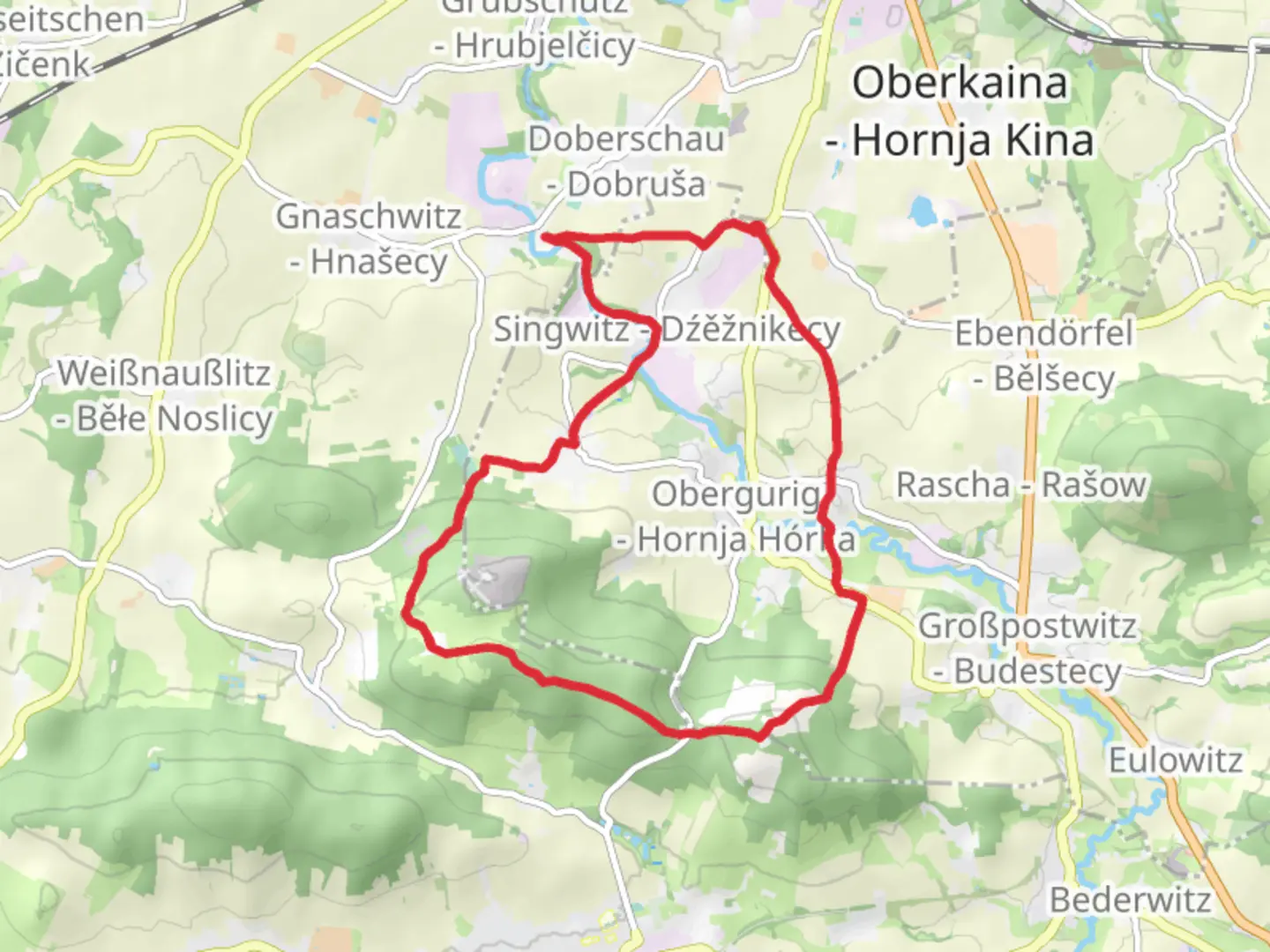 An image depicting the trail Teufelskanzel via Pumphut Steig and Oberguriger Rundwanderweg and its surrounding area.