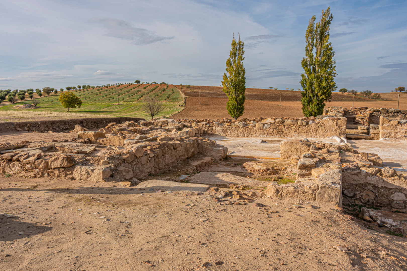 An image depicting the trail The Milestones of Orgaz PR TO 18 and its surrounding area.