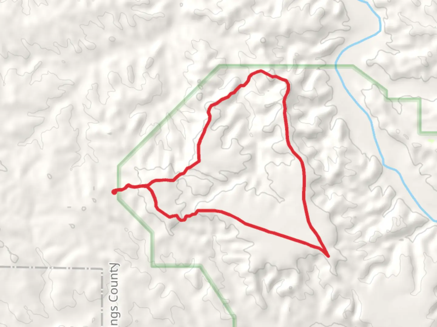 An image depicting the trail Maah Daah Hey and Petrified Forest Loop Trail and its surrounding area.