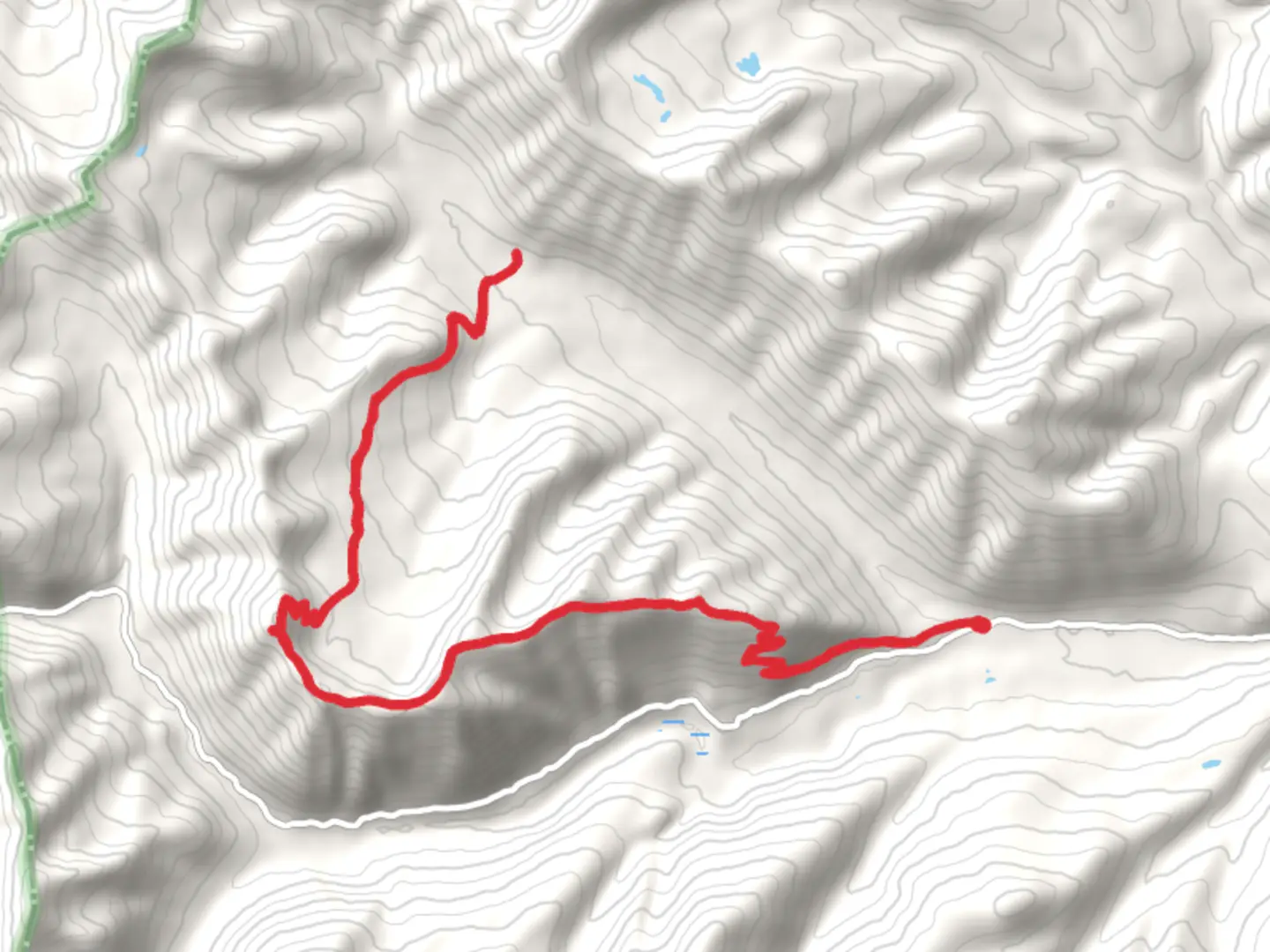 An image depicting the trail Review Mountain Trail and its surrounding area.