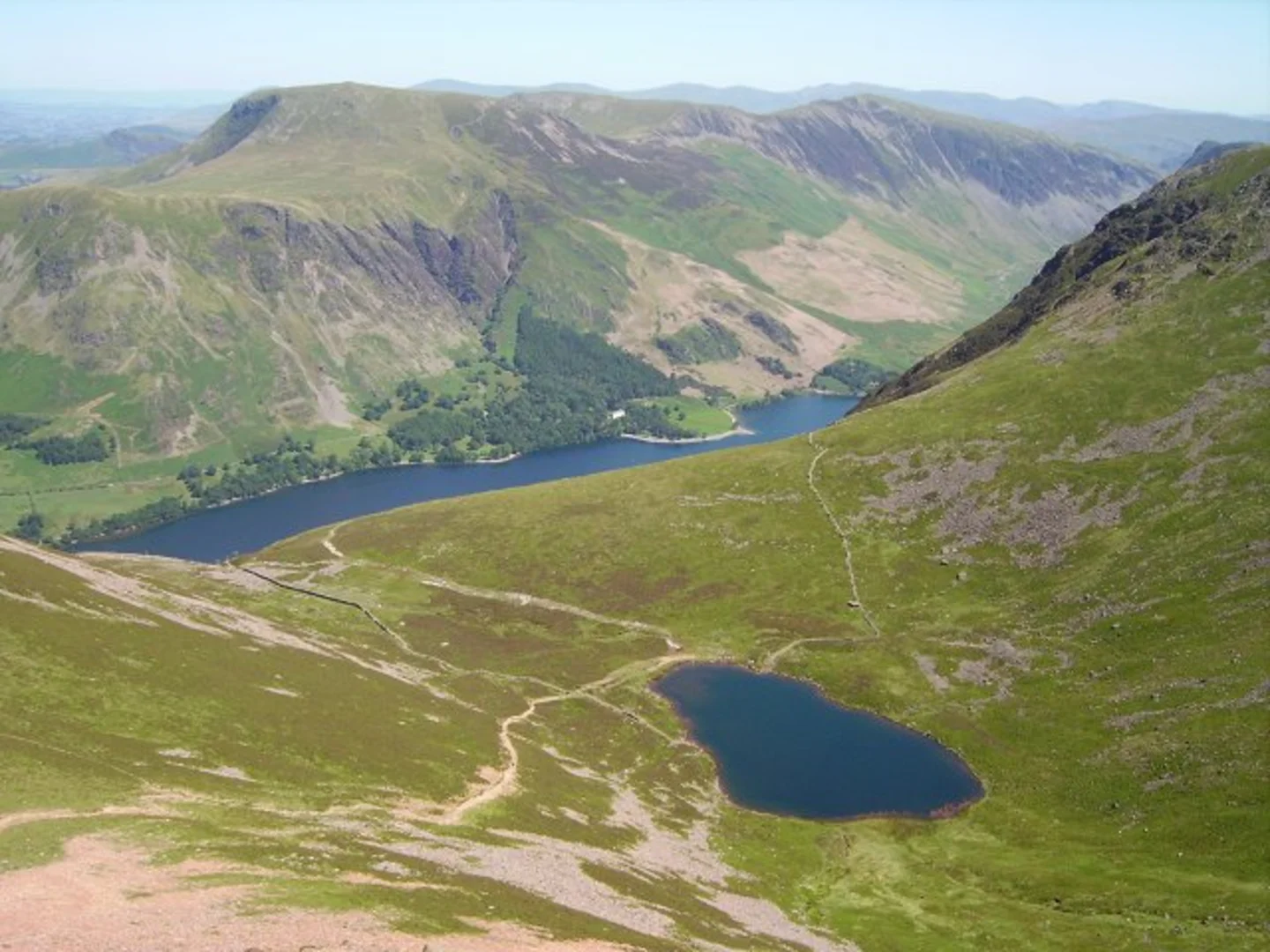 An image depicting the trail Bleaberry Tarn, Red Pike and High Crag Loop via Buttermere and its surrounding area.