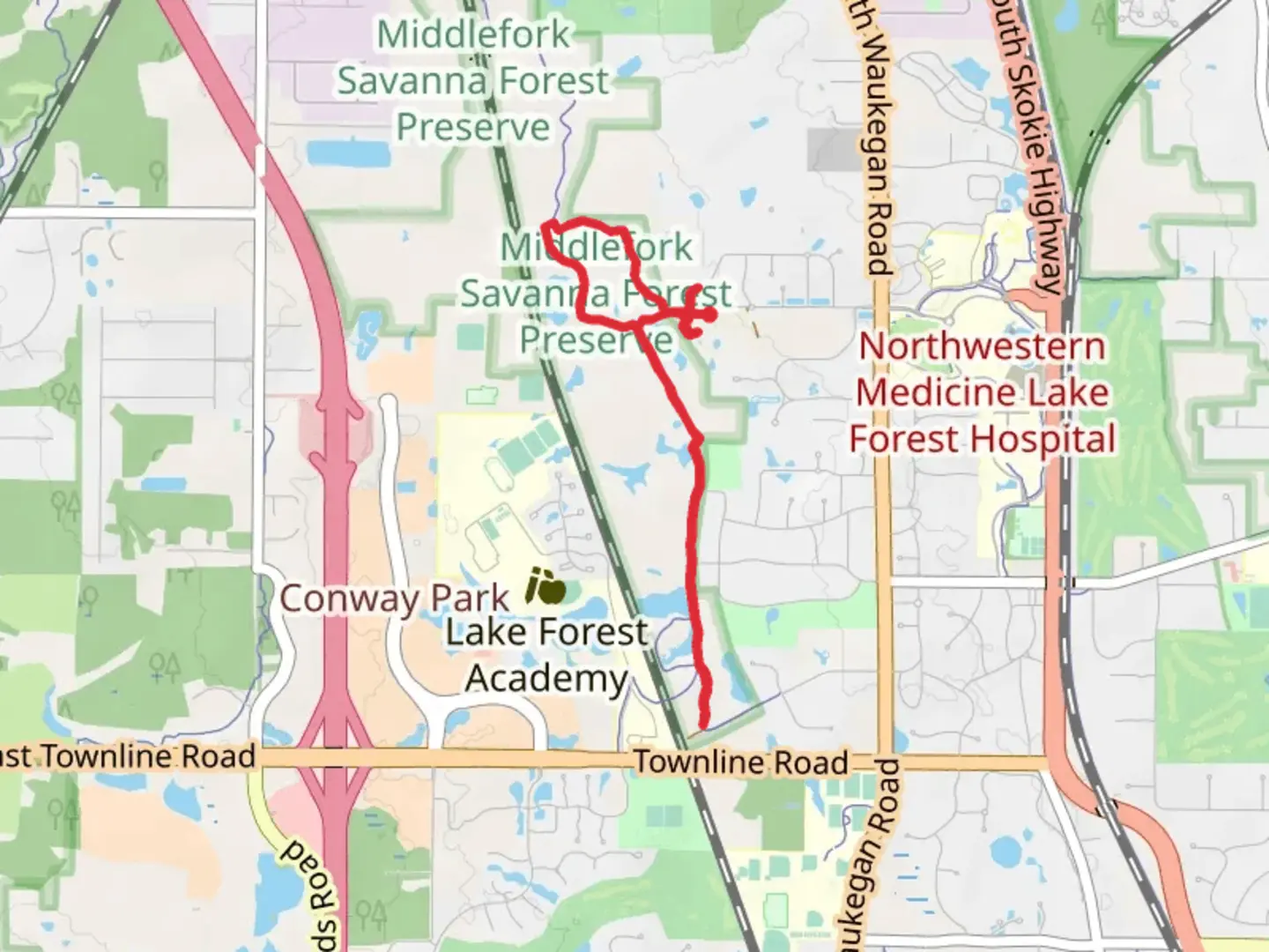 An image depicting the trail Middlefork Greenway and its surrounding area.